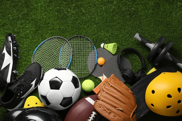 different-sports-equipment-on-green-600nw-2463190611 (1)